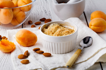 crumble with apricot and cinnamon served on table
