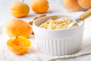 crumble with apricot and cinnamon served on table