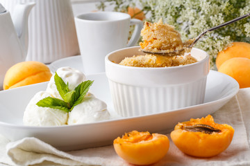 Apricot crumble topping vanilla ice cream serve in caffe