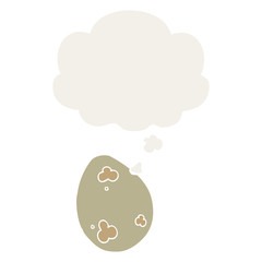 cartoon egg and thought bubble in retro style