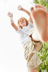 Obraz premium Boy balances skillfully while playing