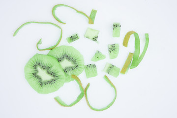 Ripe whole kiwi fruit and half kiwi fruit isolated on white background