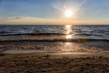 sunrise, sunset over the sea, ocean waves.