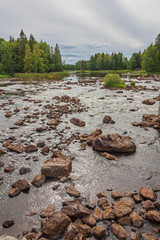 Scenic view of a river in summer before a rain. Farnebofjarden national park in Sweden