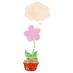 cute cartoon flower and thought bubble in retro textured style