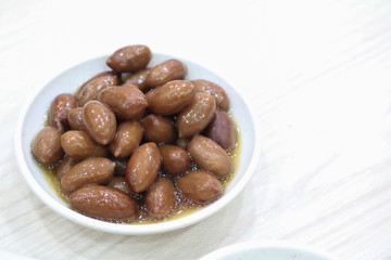 boiled peanuts snack on white container, Chinese style
