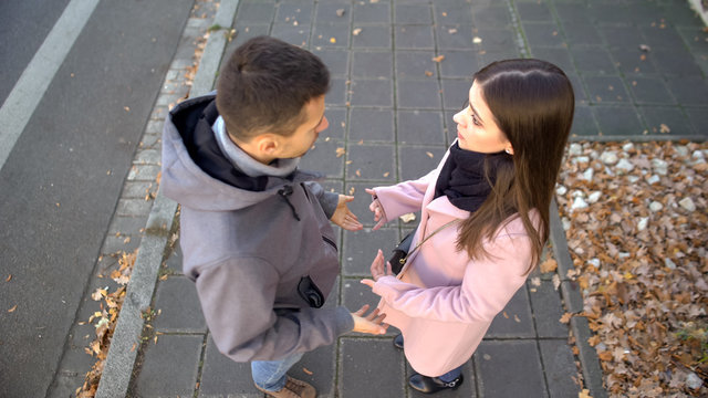 Couple arguing on street, relationship crisis, misunderstanding problem break up