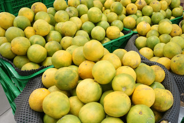 orange pile. Orange is a fresh tropical fruit