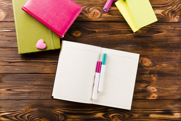 Notepad with marker pens on tablet