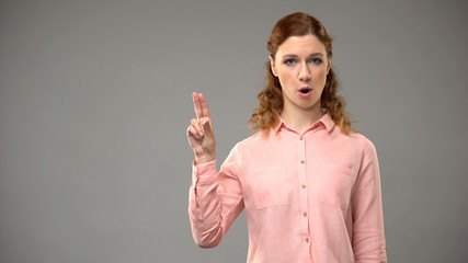 Deaf woman saying no in sign language, teacher showing words in asl, tutorial