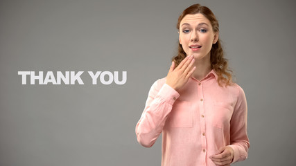 Woman saying thank you in sign language, text on background, communication
