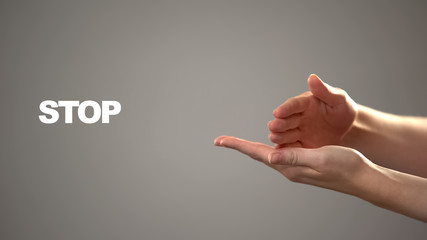 Hand signing stop in asl, text on background communication for deaf, tutorial