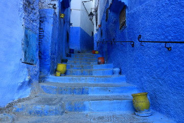 Blue street walls of the popular city of Morocco, Chefchaouen. Traditional moroccan architectural details. - 275642140