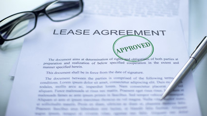 Lease agreement approved, seal stamped on official document, business contract