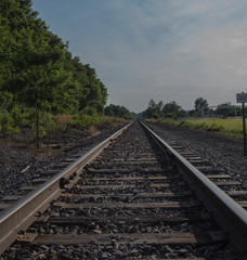 Fototapeta premium railway leading into he blue sky 
