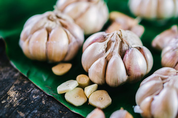 closeup garlic cloves on wooden table 