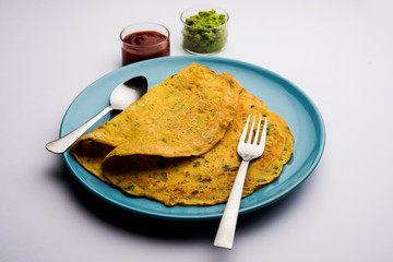 Chilla or Besan cheela is a simple pancake made with chickpea flour and some basic ingredients served with green chutney and tomato sauce, also known as veg-omelette
