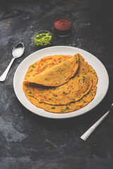 Chilla or Besan cheela is a simple pancake made with chickpea flour and some basic ingredients served with green chutney and tomato sauce, also known as veg-omelette