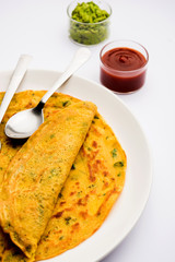 Chilla or Besan cheela is a simple pancake made with chickpea flour and some basic ingredients served with green chutney and tomato sauce, also known as veg-omelette