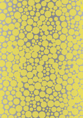 Macro close up of yellow soap bubbles.