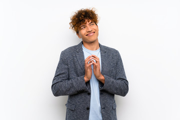 Fashion african american man over isolated white wall scheming something