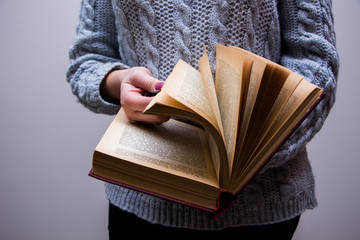 Woman with book in hands 