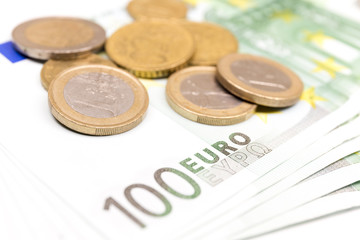 Close-up Stack of Euro banknotes and coins. 500 Euro banknotes. European currency money banknotes isolated on white backdrop. Perspective view closeup. Salary, savings, european union economic crisis 