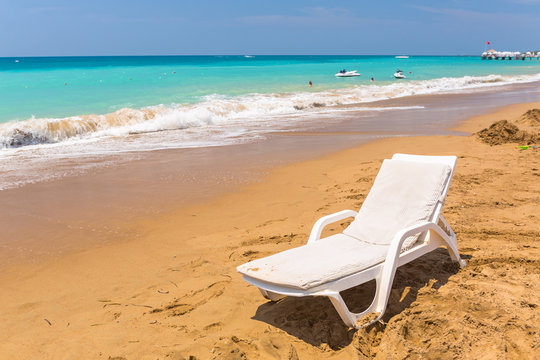 Sun lounger on the beach on Turkish Riviera near Side