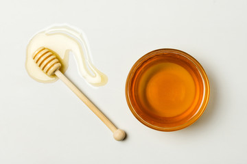 Top view tea with spoon and honey stain