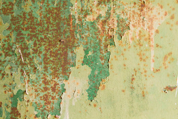 Old green rusty and distressed wall detail