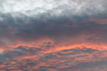 Red sky with blue clouds