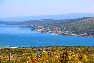 View of Ciovo island from meadow with wild Mediterranean plants on the hill above Split, Croatia.