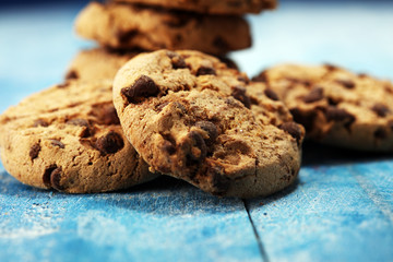 Chocolate cookies on wooden table. Chocolate chip cookies