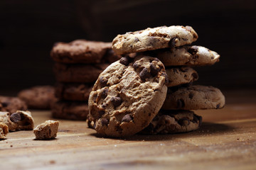 Chocolate cookies on wooden table. Chocolate chip cookies