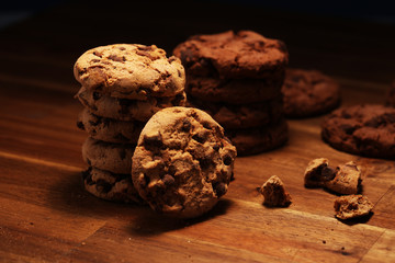 Chocolate cookies on wooden table. Chocolate chip cookies