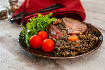 Green lentils with smoked pork sausage smoked choice, carrots and onions