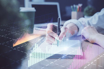 Forex chart displayed on woman's hand taking notes background. Concept of research. Double exposure