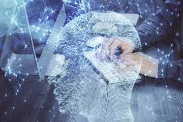 Man typing on keyboard background with brain hologram. Concept of big Data. Double exposure.
