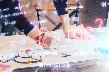 Student or teacher with mathematical and scientific formulas. Concepts of education.