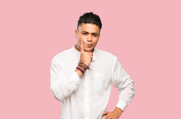 Young man Looking front on colorful background