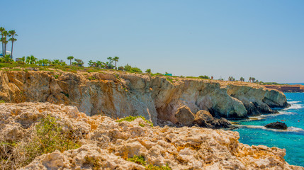 Fototapeta na wymiar unreal blue and clear sea and rocks off the coast of Ayia Napa, Cyprus