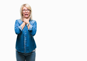Young beautiful blonde woman wearing glasses over isolated background shouting and suffocate because painful strangle. Health problem. Asphyxiate and suicide concept.