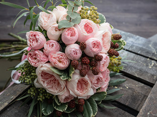 Beautiful wedding bouquet of shrub and peony gently pink roses. © Людмила Селянинова
