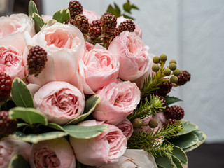 Beautiful wedding bouquet of shrub and peony gently pink roses.