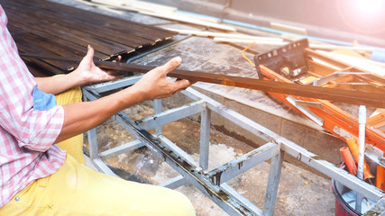 Carpenter to showing Pie wood brown color paint