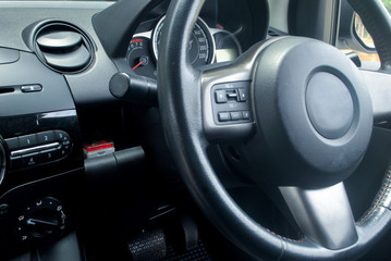 Obraz na płótnie Canvas Car dashboard, radio, turn signal, mirror system and other panel