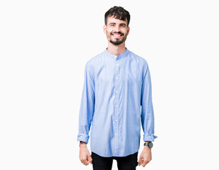 Fototapeta premium Young handsome business man over isolated background with a happy and cool smile on face. Lucky person.