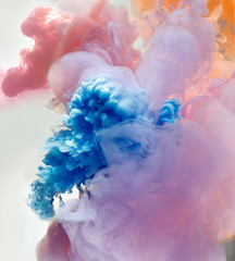 pastel ink colors in water splashing