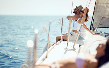 Cruise vacation. couple enjoying a summer day on a boat.