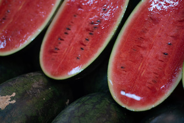 Fresh watermelon on fruitshelf in supermarket for sale